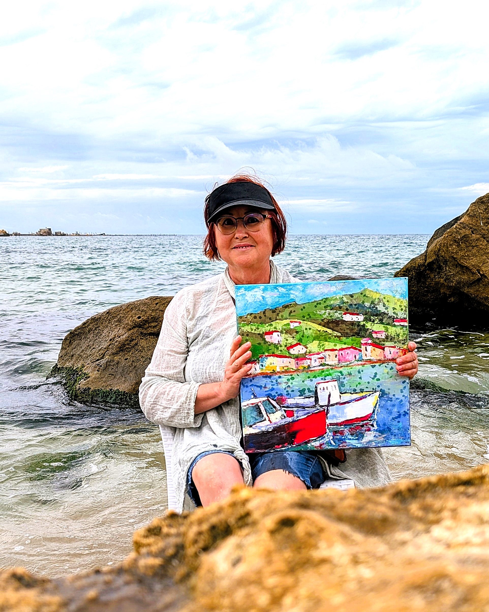 Vera Zibrova with her painting